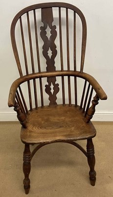 Lot 692 - A high back elm and beech Windsor chair, 108 x...