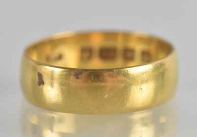 Lot 1251 - A 22ct gold band ring, size M, approx 3.8g.