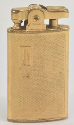 Lot 1186 - RONSON; an early 20th century 9ct yellow gold...