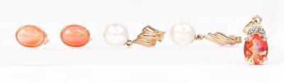 Lot 889 - A pair of 9ct yellow gold stud earrings set...