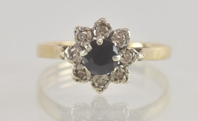 Lot 1356 - A 9ct gold floral cluster ring, with claw set...