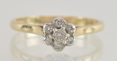 Lot 1357 - A 9ct gold diamond set floral cluster ring,...