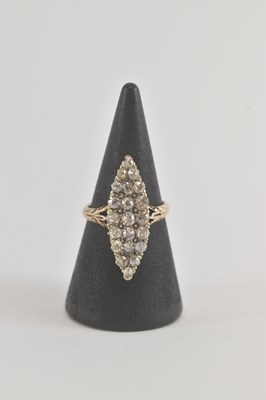 Lot 1236 - An Art Deco gold and diamond cluster ring, the...