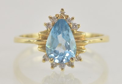 Lot 1358 - A 9ct gold topaz set dress ring, with a cut...