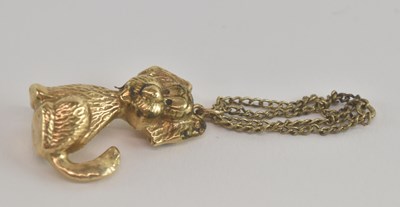 Lot 1433 - A 9ct gold necklace pendant in the form of a...