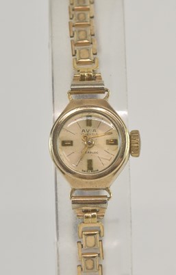 Lot 1741 - AVIA; a lady's 9ct gold watch head, the...
