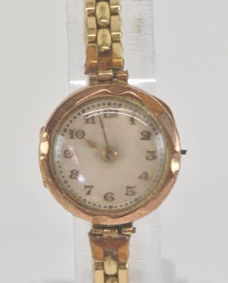 Lot 1729 - A lady's vintage wristwatch, the silvered dial...
