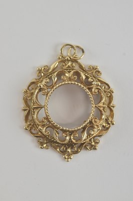 Lot 1187 - A 9ct gold large coin pendant mount with open...
