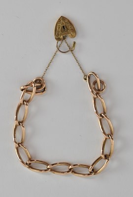 Lot 1499 - A 9ct rose gold bracelet, with elongated links...