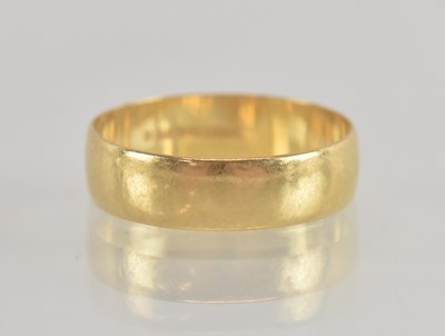 Lot 1292 - An 18ct gold band ring, size R, approx 3.2g.