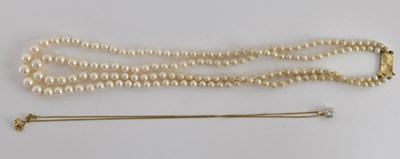Lot 1435 - A simulated pearl necklace with gold clasp and...