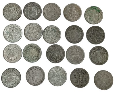Lot 1674 - Twenty half crowns dating between 1920 and...