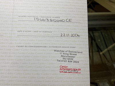 Lot 551 - CARTIER; a gentleman's bi-metal Santos...