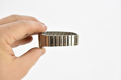 Lot 551 - CARTIER; a gentleman's bi-metal Santos...