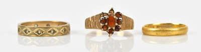 Lot 426 - A 22ct yellow gold wedding band, size I,...