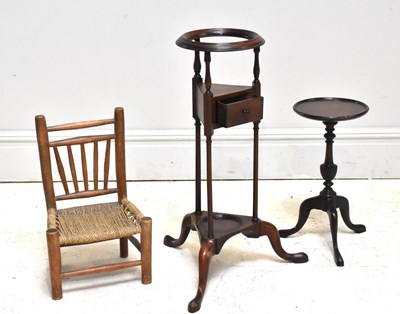 Lot 1141 - A Georgian mahogany wig stand of typical form...