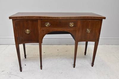 Lot 1117 - A 19th century mahogany serpentine sideboard,...