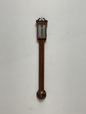 Lot 1438 - A reproduction mahogany stick barometer, 95cm.