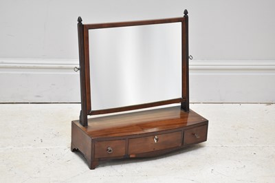 Lot 1193 - A 19th century mahogany toilet mirror with...