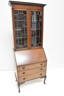 Lot 1146 - Early 20th century mahogany bureau bookcase,...