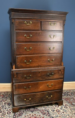 Lot 2934 - A George III oak chest on chest, with two...