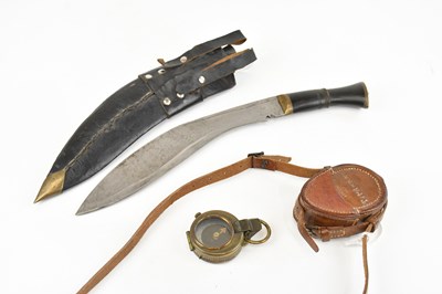 Lot 1353 - A 19th century kukri, in leather scabbard,...