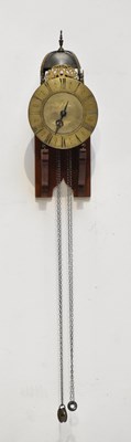 Lot 1264 - A large brass lantern clock, the applied face...