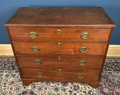 Lot 2840 - A George III oak chest of four graduated long...