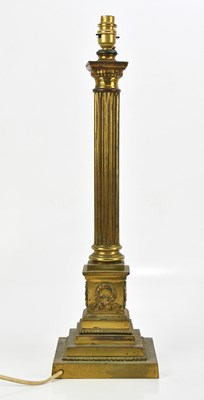Lot 1814 - A brass fluted column table lamp, height 57cm.