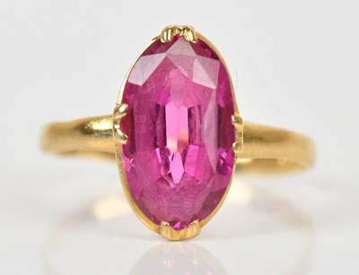 Lot 321 - An 18ct yellow gold dress ring, with central...