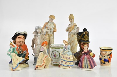 Lot 1580 - A collection of seven figures including a...