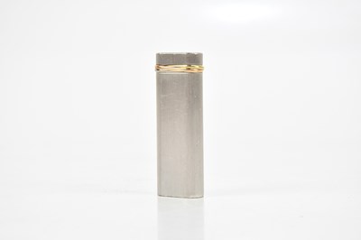 Lot 669 - CARTIER; a Trinity lighter, no. 67086X,...