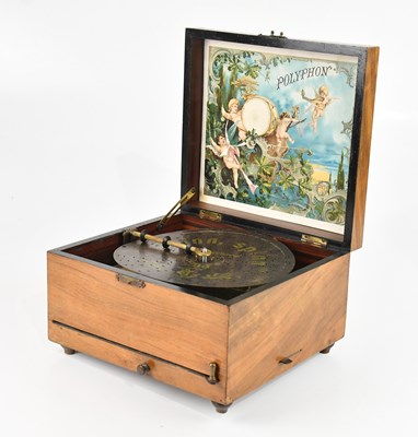 Lot 795 - A walnut cased Polyphon with disc.