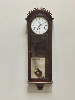 Lot 279 - COMITTI OF LONDON; a reproduction walnut wall...