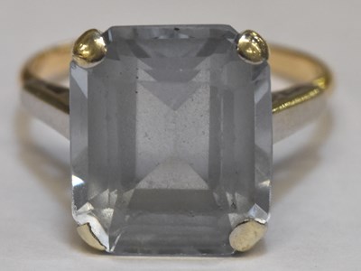 Lot 1320 - A 9ct gold dress ring set with a cushion cut...