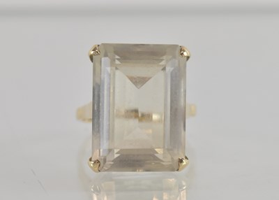 Lot 1321 - A 9ct gold dress ring with stepped claw set...
