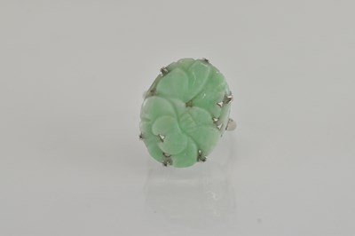 Lot 1295 - A Chinese 9ct white gold ring, the table...