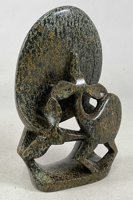 Lot 251 - A Zimbabwean Shona stone carving of two...