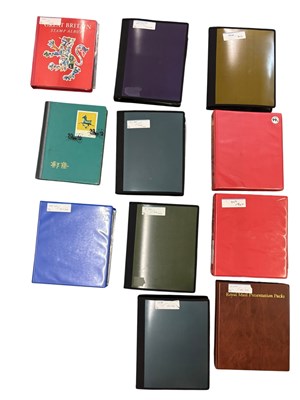 Lot 470 - Eight albums of approximately three hundred...