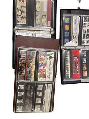 Lot 470 - Eight albums of approximately three hundred...