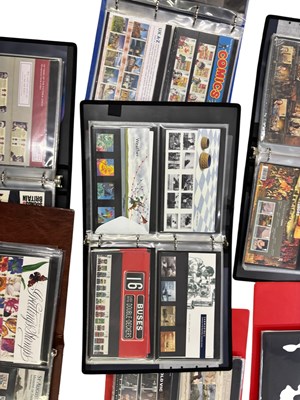 Lot 470 - Eight albums of approximately three hundred...