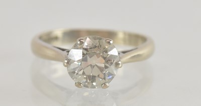 Lot 1221 - An 18ct white gold diamond solitaire ring, the...