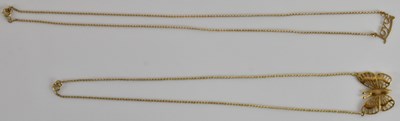 Lot 1406 - A 9ct yellow gold butterfly pendant, suspended...