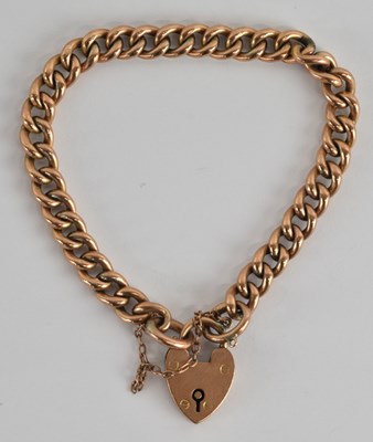 Lot 1501 - A 9ct yellow gold Cuban link bracelet with...