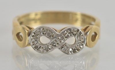 Lot 1301 - A 9ct yellow and white gold diamond chip set...