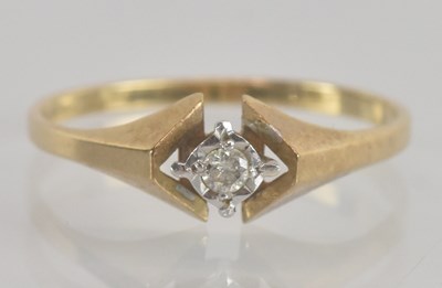 Lot 1307 - A 9ct yellow gold diamond set solitaire ring,...