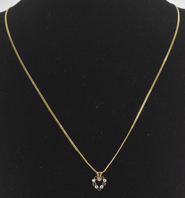 Lot 1411 - A 9ct yellow gold fine link necklace, length...