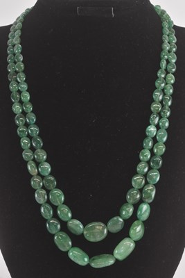 Lot 1529 - A Chinese double strand jade bead 'prayer bead...