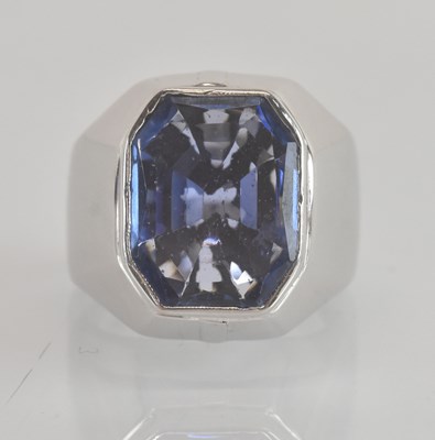 Lot 1216 - An impressive white metal sapphire set ring,...