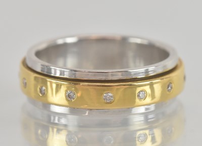 Lot 1223 - An 18ct yellow and white gold diamond set...